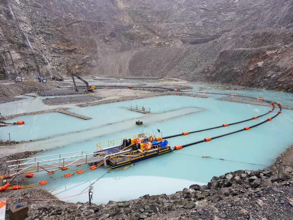 pontoon mounted electric pump-sets in situ in dirty harsh water
