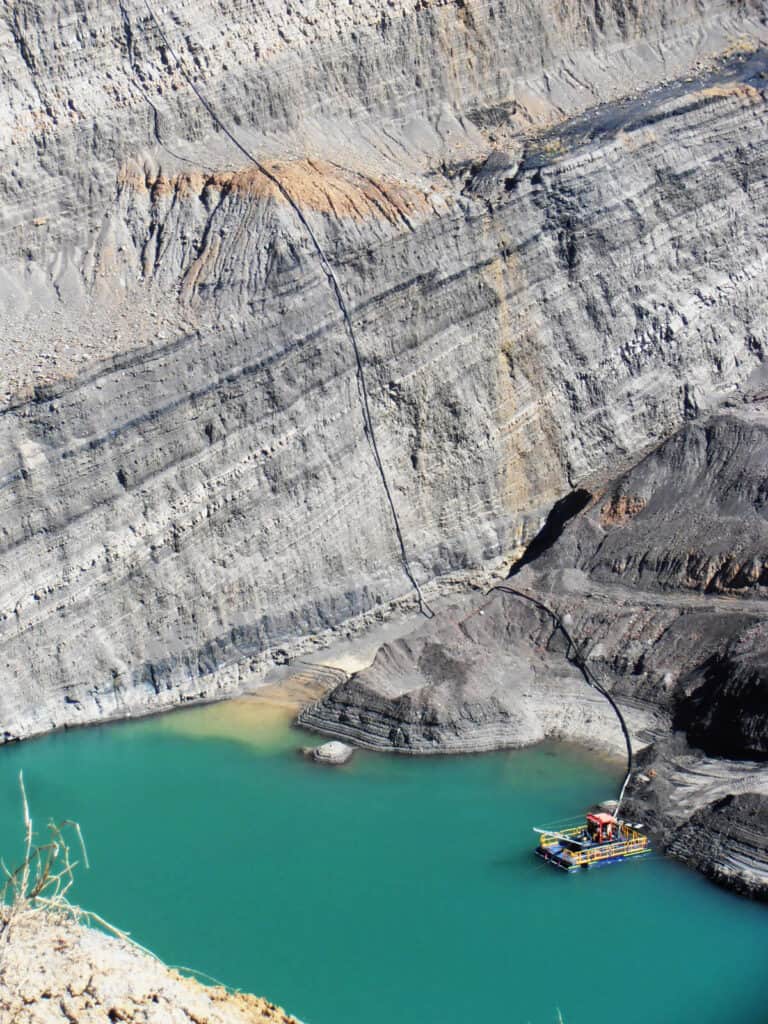 Pontoon mounted diesel pump-set at the bottom of a deep pit