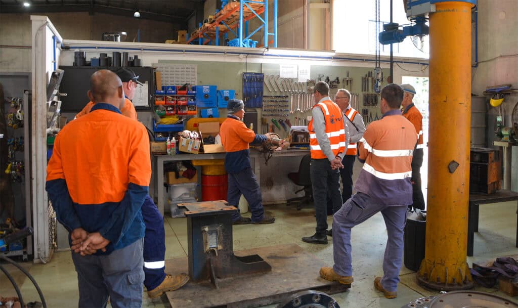 Aquaflo Hire team in workshop going through workflow